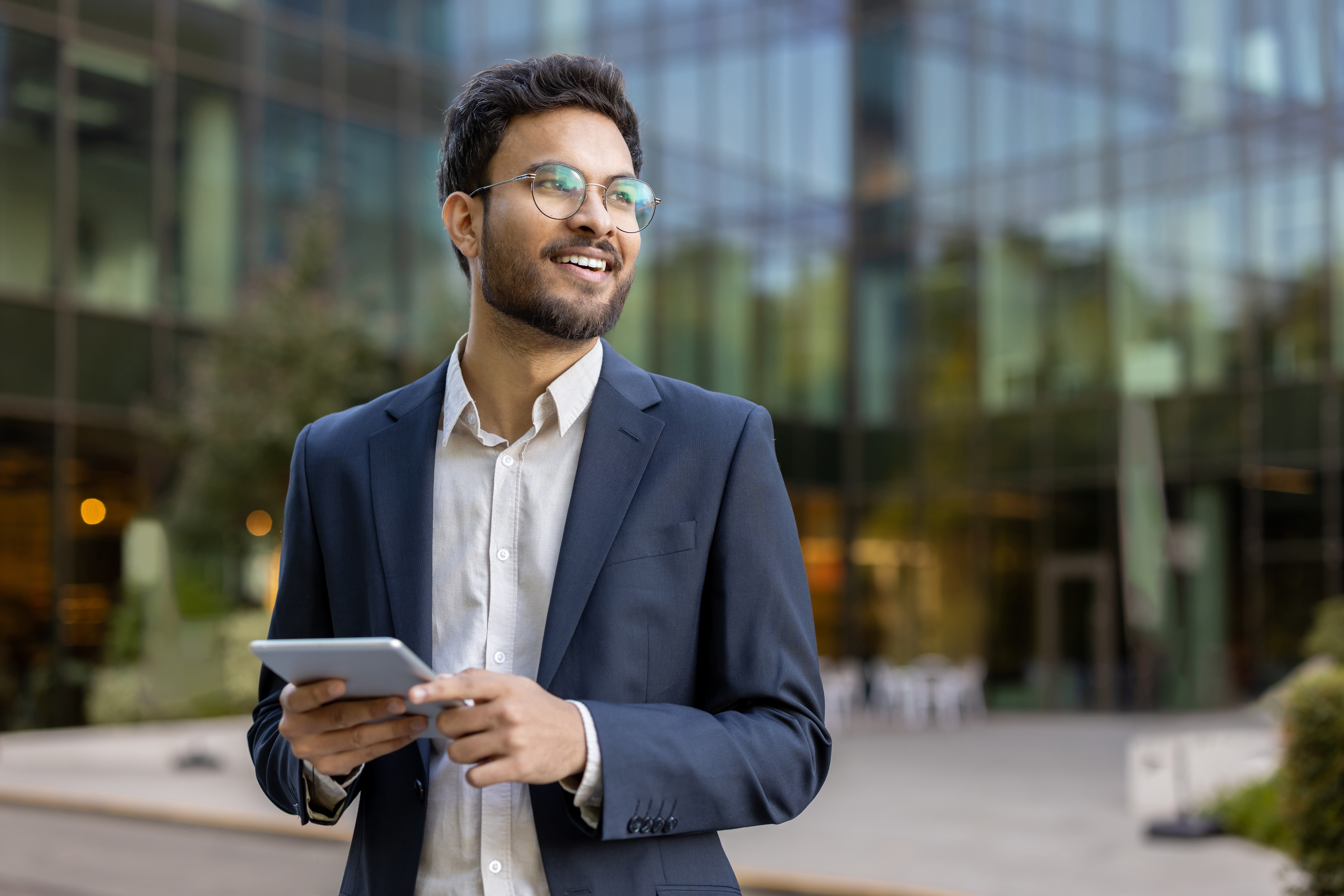 Confident professional male smiling, representing success
